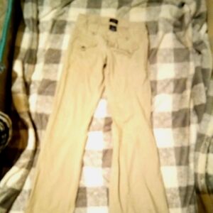 Rue 21 dress pants cream colored line down middle of both legs size 2